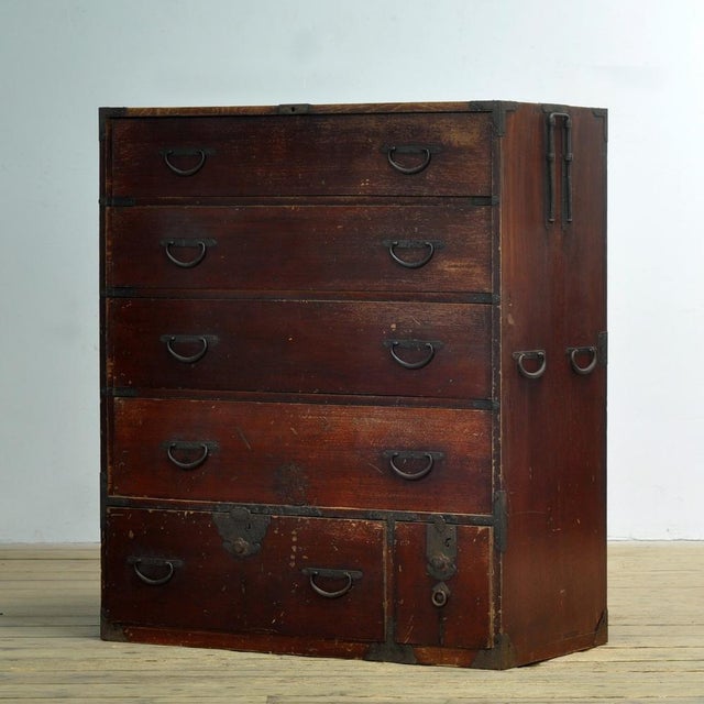 Traditional Japanese Tansu chest of drawers from the 1870s. Manufactured during the late Meiji era (1868-1912). This piece...