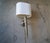 Antique sconce lamp for sale. Made of silver, and in great working condition. Very beautiful detailing on the body with...