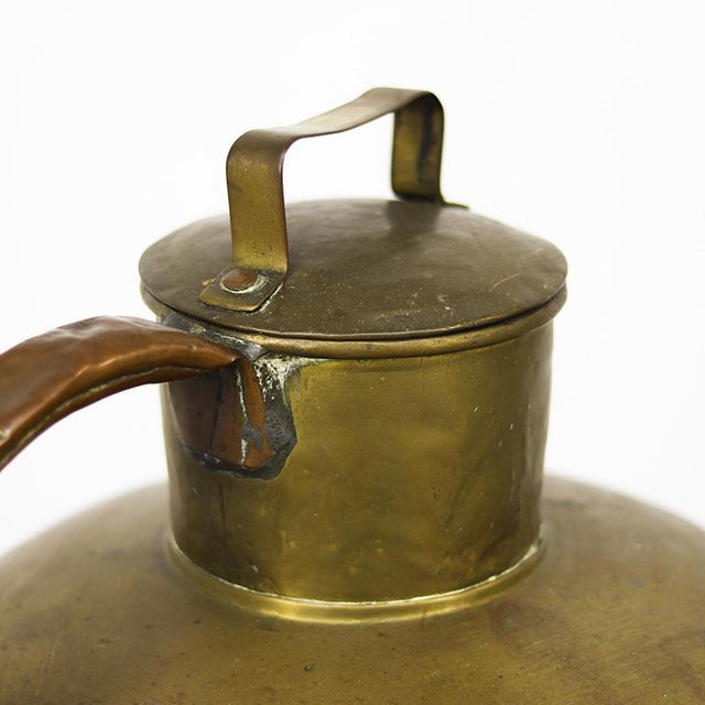 This special antique French milk jug, also known as a canne à lait, was used in the 19th century to transport milk from...