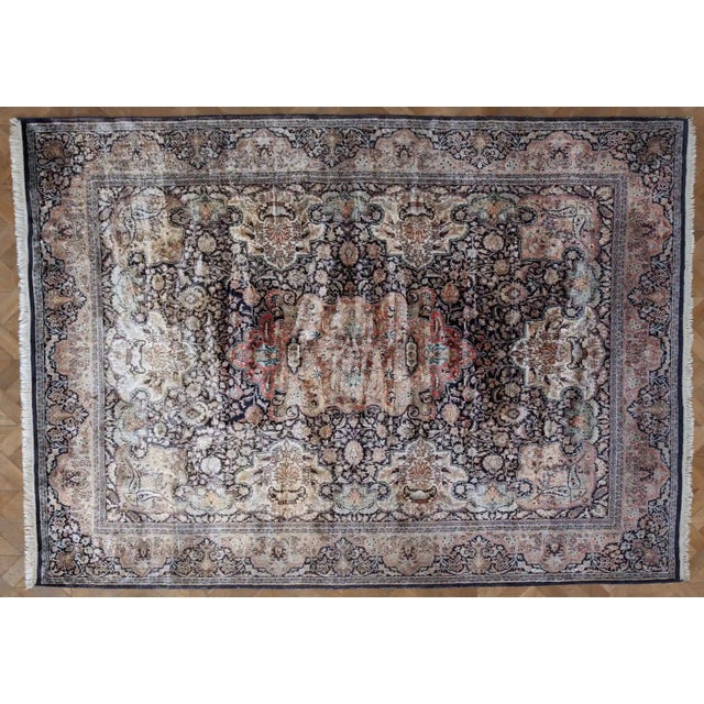 Hand-knotted silk rug from Kashmir. Silk on cotton warp. Fine weave with a density of around 360,000 knots per m2. The rug...