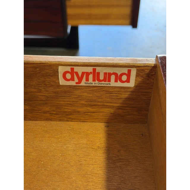 Exceptional vintage Danish executive desk by Dyrlund, crafted in richly figured rosewood with dramatic grain throughout....