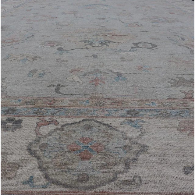 2020s Large Oushak Rug With Floral Motifs & Muted Colorful Tones on Neutral Background For Sale - Image 4 of 13