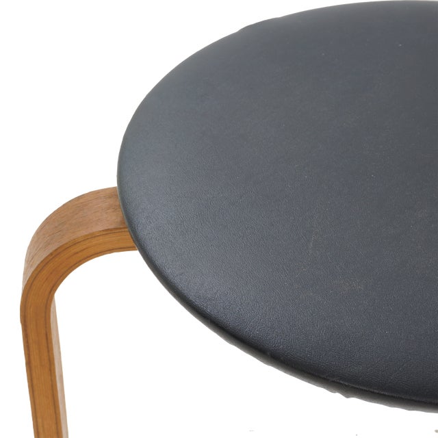 - 17.5"h, 14.25"dia - Made in Canada circa 1970s, in the style of Alvar Aalto - Bentwood, vinyl upholstery - Condition:...