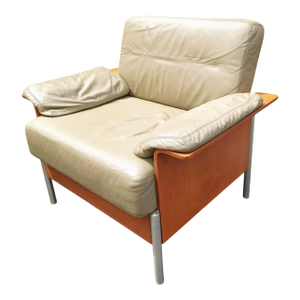 Keilhauer MCM Chair a Masterclass in Material Harmony, Seamlessly Blending Classic Luxury/ Industrial Edge.