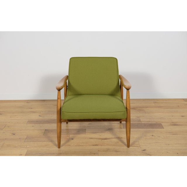 Polish armchair produced in Gościcińskie Fabryki Mebli in the early 1960s. This project, due to the specific profile of...