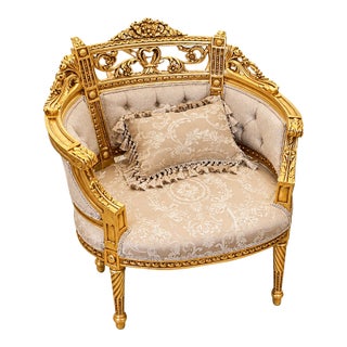 French Louis XVI Style Armchair – Beige Damask Upholstery, Tufted Back & Ornate Gold Leaf Frame For Sale