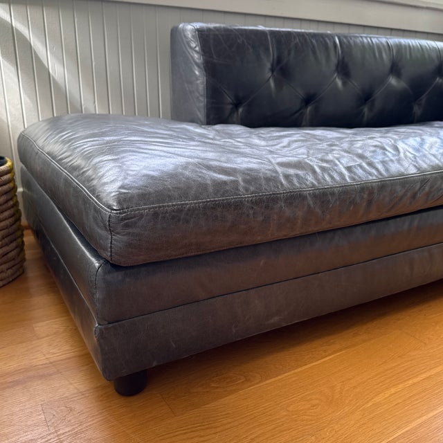 Custom Benchmade Modern chaise style sofa in a smoke (borderline blue) leather.