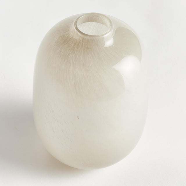 A modern update to the simple glass form, our mouth blown vase is made with pot color, not sprayed. A classic design in a...