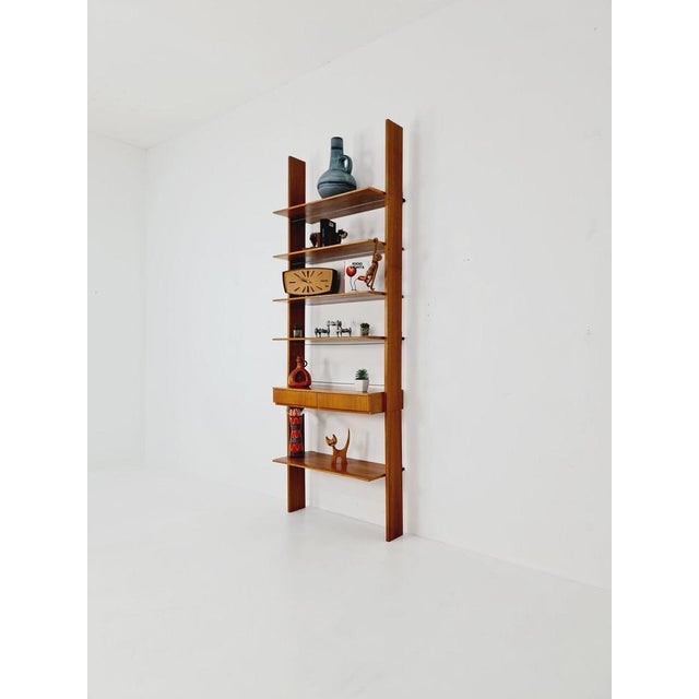 German vintage bookshelf walnut , 1960s Dimensions: Height: 242 cm Width: 84 cm Depth: 35 cm It is in vintage condition,...