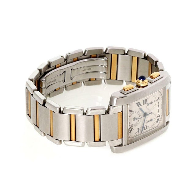 This is an elite and elegant authentic men's wrist watch by Cartier from the Tank Francaise collection, the case is...
