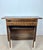 Mid 20th century Spanish rustic commode crafted in solid wood with a warm aged patina. The piece features a single upper...