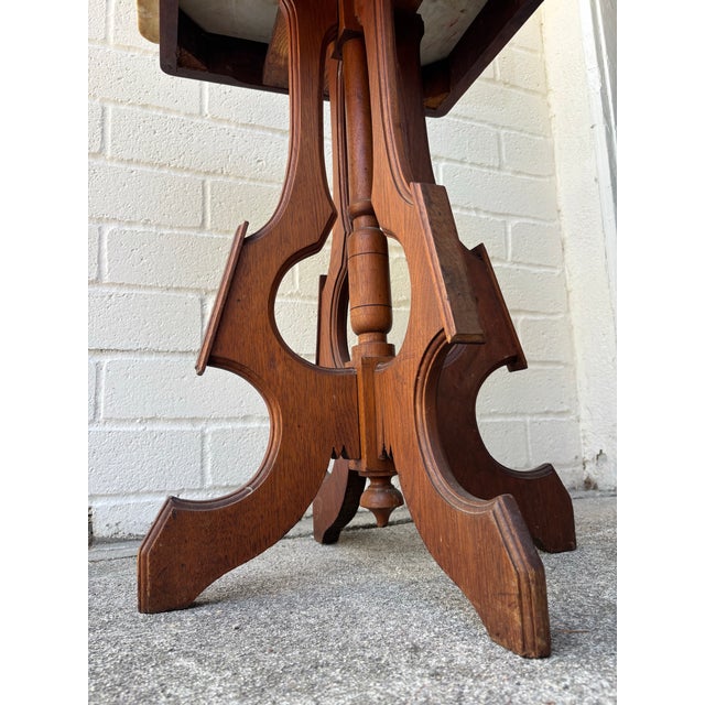 Antique Eastlake Marble Top Lamp Table / Parlor Table. H: 28.5 inches W: 19 inches D: 16 inches
