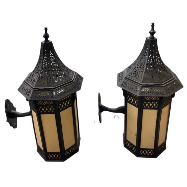 Elevate your indoor or outdoor living space with this striking pair of vintage wall-mounted lanterns, designed to bring a...
