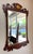 Elegant Henkel Harris Model H-6 wall mirror crafted in rich mahogany with classic Chippendale-inspired styling. Features a...