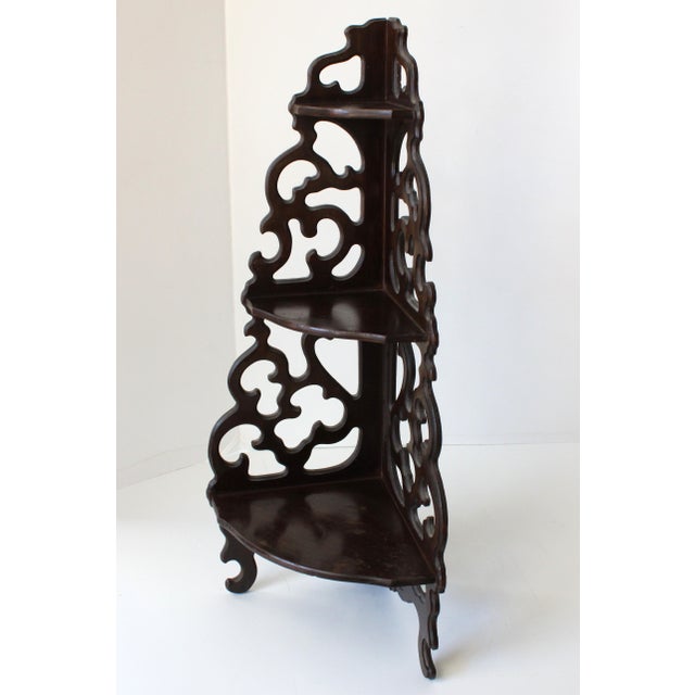 Mid 20th Century Vintage 3-Tier Mahogany Wood 24” Tall Wall Shelf. Beautiful vintage mahogany 3-tier wall shelf. The side...