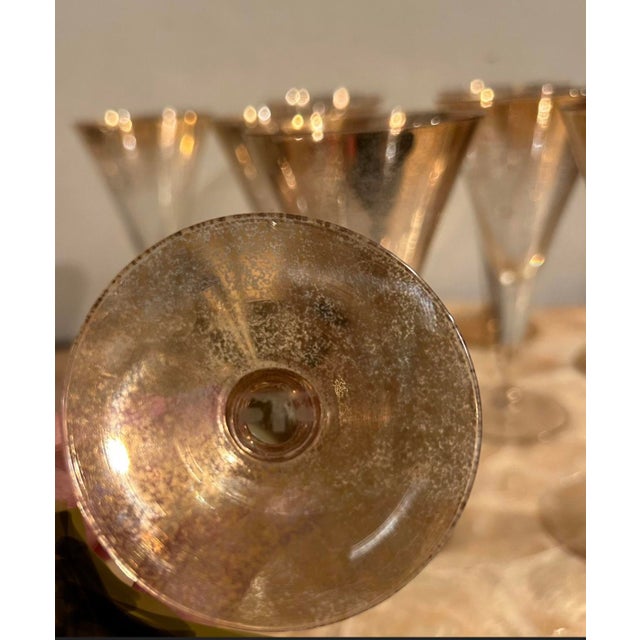 From Modcabana. Set 9 Stunning and rare Dorothy Thorpe signed Gold Fleck champagne or wine flutes. These are all in...