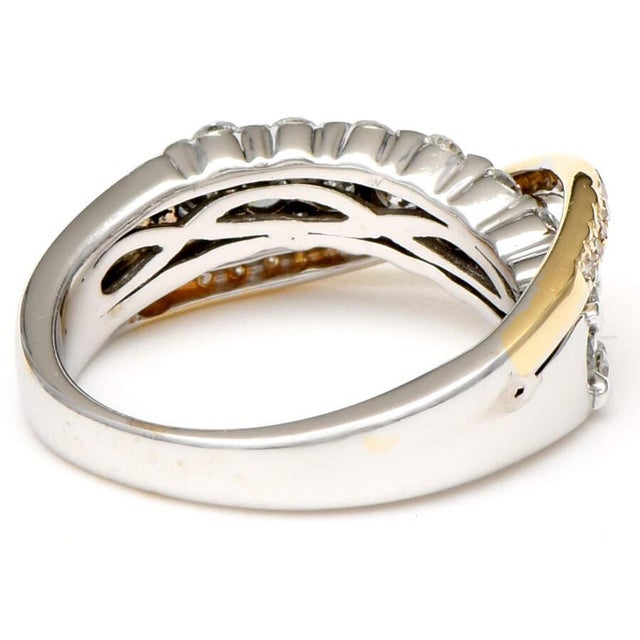 This gorgeous diamond statement ring has a unique style and plenty of class for any special occasion. Made in both white...