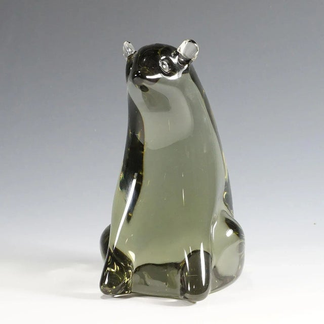 Bear Artglass sculpture Designed by Livio Seguso ca. 1970s A powerful stylized sculpture of a bear in solid smoke grey...