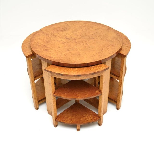 A gorgeous and extremely well made Art Deco birds eye maple nesting coffee table. This was made in England, it dates from...