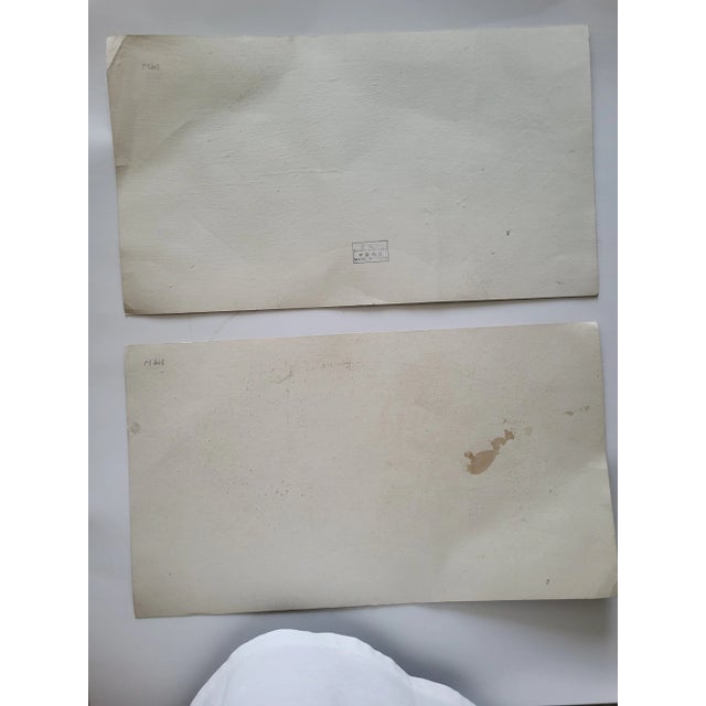 Two fan shaped Chinese paintings. Acquired in Hong Kong in early 1980s. Hand painted. Mounted on silk brocade. Woman with...