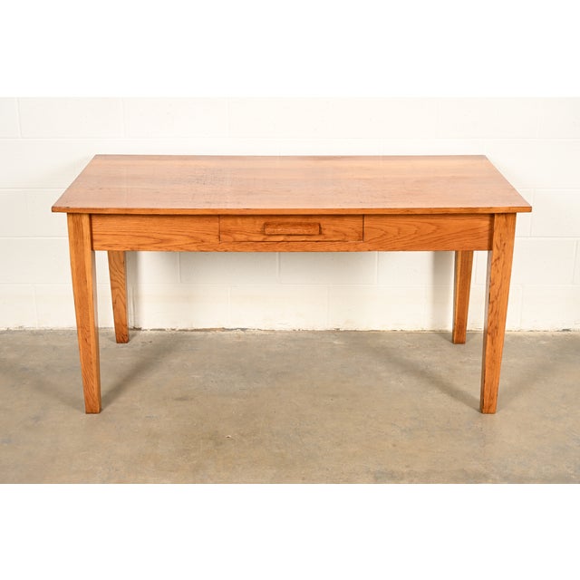 An exceptional antique Mission or Arts & Crafts period quarter sawn oak writing desk or library table In the Manner of...
