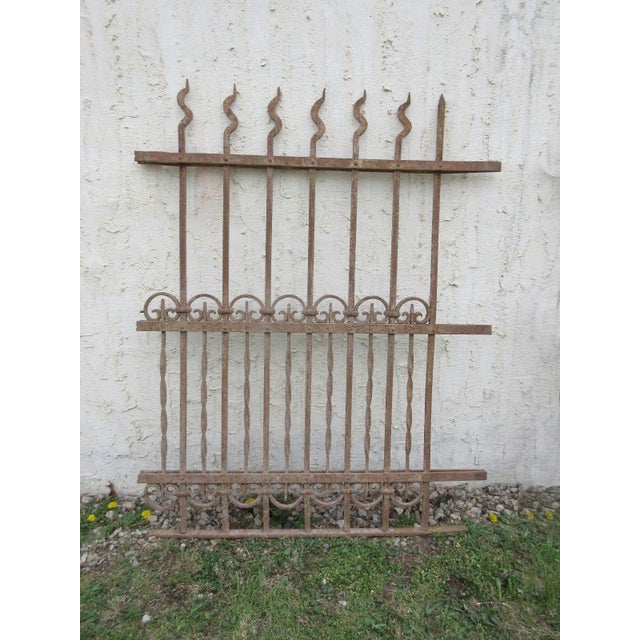 A piece of architectural salvage. Heavy and sturdy. Piece does show signs of age related wear including rust, flaking...
