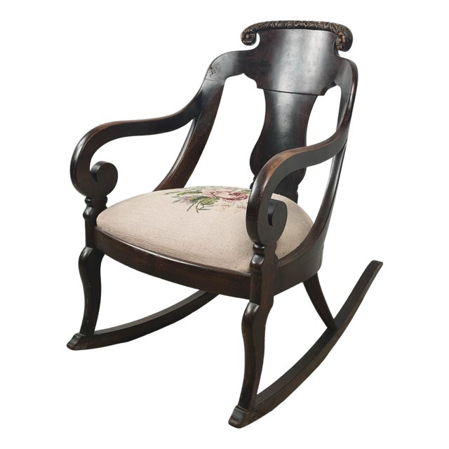Antique American Carved Wood Rocking Chair With Needlepoint Seat For Sale
