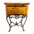 An exceptional vintage tessellated burl wood nightstand or side table featuring a striking geometric veneer case raised on...