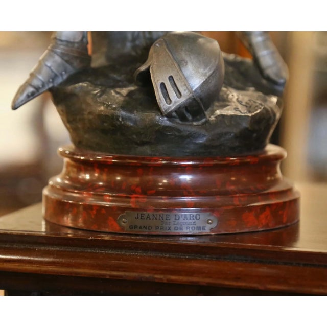 Striking in scale and exceptionally detailed, this antique French sculpture depicts Jeanne d’Arc (Joan of Arc) in full...