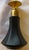 1920's-1930's Black painted glass perfume bottle. Gold tone collar and a gold tone and black enameled stopper. Dauber...
