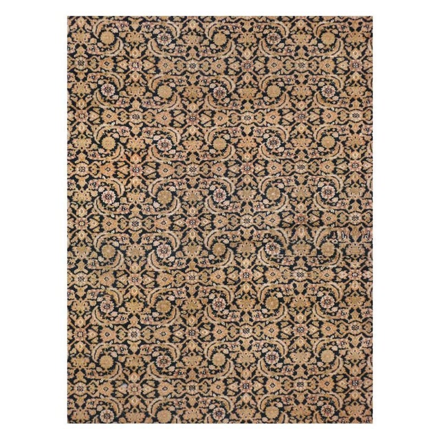 This early 20th-century Persian Khorassan carpet presents an exceptionally intricate allover floral composition across a...