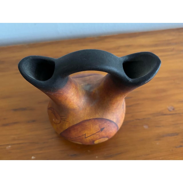 Signed Pueblo style wedding vase with a bear motif. Marked "Made in Mexico." Most items found at Pub & Oasis are vintage...