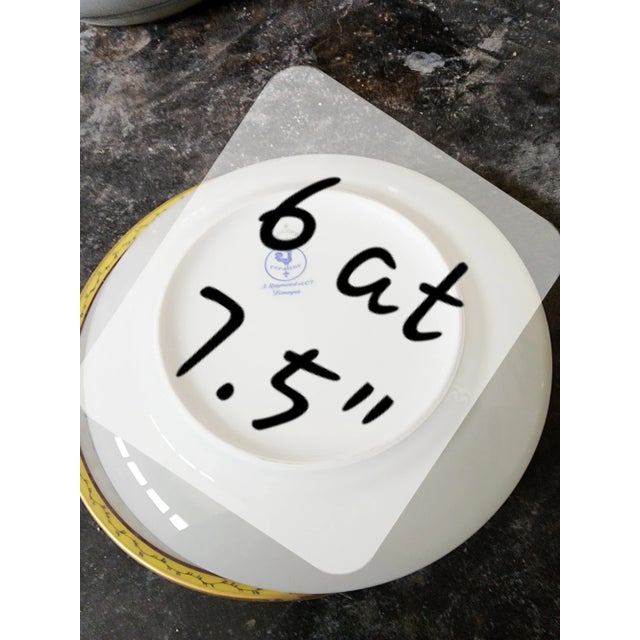 Pretty yellow and white with floral decorations French Limoges porcelain Plates by Raynaud.