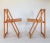 Pair of 1960's beechwood foldable chairs designed by Aldo Jacober for Alberto Bazzani. Folding mechanism works smoothly....