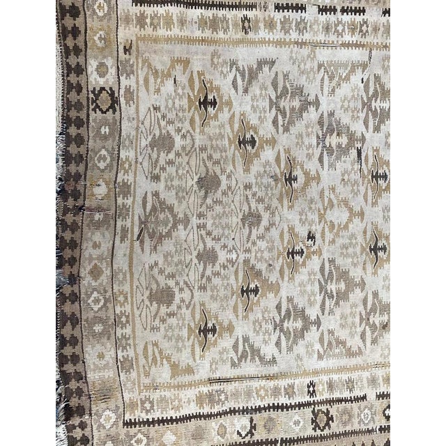Wonderful early 20th century long Turkish runner Kilim with beautiful geometric and tribal design and light colors,...