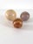 Beautiful set of three banded jasper orbs in varying sizes and colors. Graduated in size, these would look lovely on...