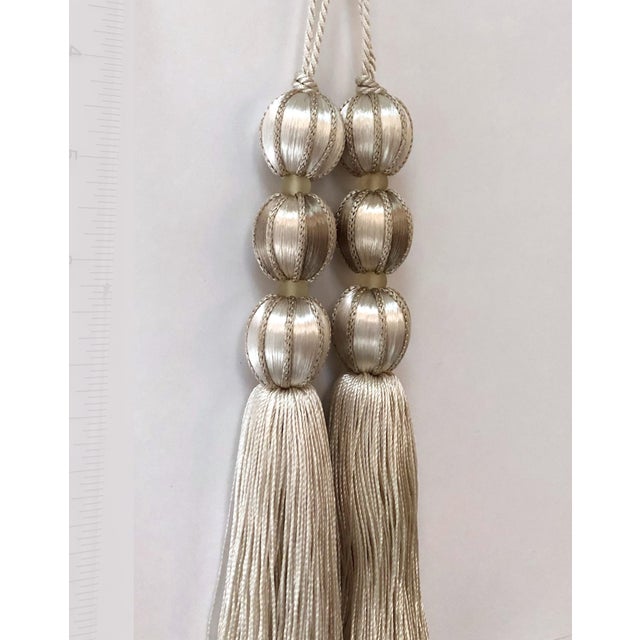 Handmade Ivory and Taupe satin beaded key tassel is perfect for adding a touch of a coastal chic vibe to any space....