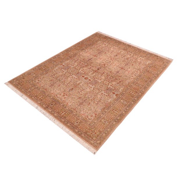 Designed with mesmerizing intricacy and gorgeous color palette, this hand-knotted masterpiece demonstrates the beauty and...