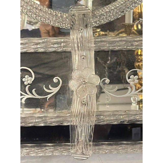 The Vintage Venetian Etched Glass Mirror is a timeless piece that adds an elegant touch to any room. The mirror features...