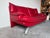 Striking vintage Postmodern Italian sofa in the style of Nicoletti Salotti, featuring bold sculptural lines and rich red...