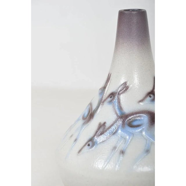 Vintage vase with the motif of deers in different positions. The vase was made in the 1970s by the German company Goebel....