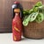 This vintage Japanese sōsaku kokeshi from the 1970s is a work by Kazuo Takamizawa and carries the title “Camellia Girl”....