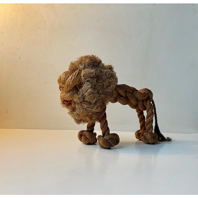 A rare example of the danish toy-design-master kay bojesen work. This lion in braided natural rope was designed i...