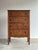 This antique five-drawer dresser features a narrow upright silhouette with richly figured tiger oak grain, turned front...