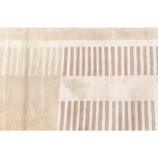This striking Deco-inspired contemporary runner captures the elegance of geometric abstraction with subtle luxury. Hand-...
