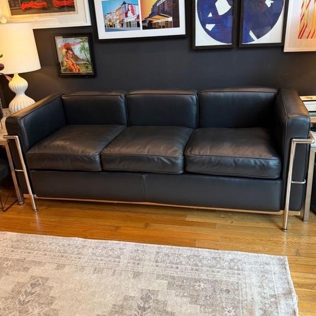 Le Corbusier Petit Modele Three Seater Sofa This design of Le Corbusier’s LC3 sofa boasts clean lines and a modern...