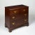 The rectangular top with molded edge, over two short and two long drawers lined with 18th century blue tissue paper, and...
