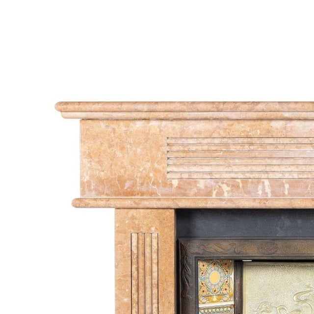 Decoration - Art Nouveau fireplace. French; early 20th century, in pink marble and metal; decorated with ceramic tiles...