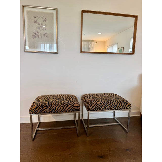 A striking pair of vintage Ethan Allen stools, restored and newly upholstered in black-and-gold tiger-print chenille. The...