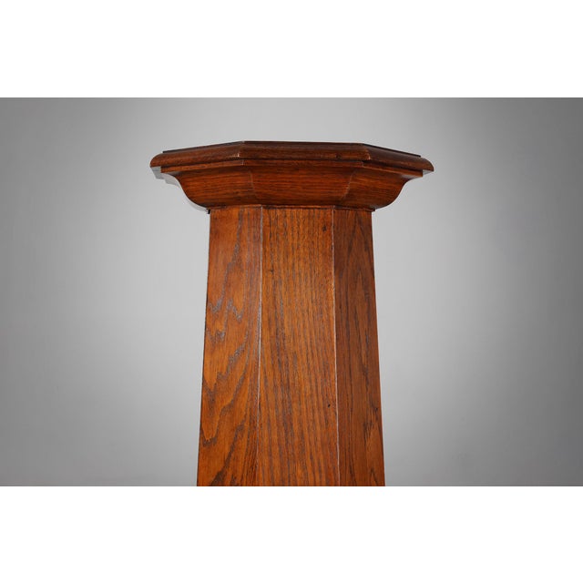 France / 1920 / Pedestal / oak / Art Deco Elevate your interior with this striking French Art Deco pedestal, crafted in...